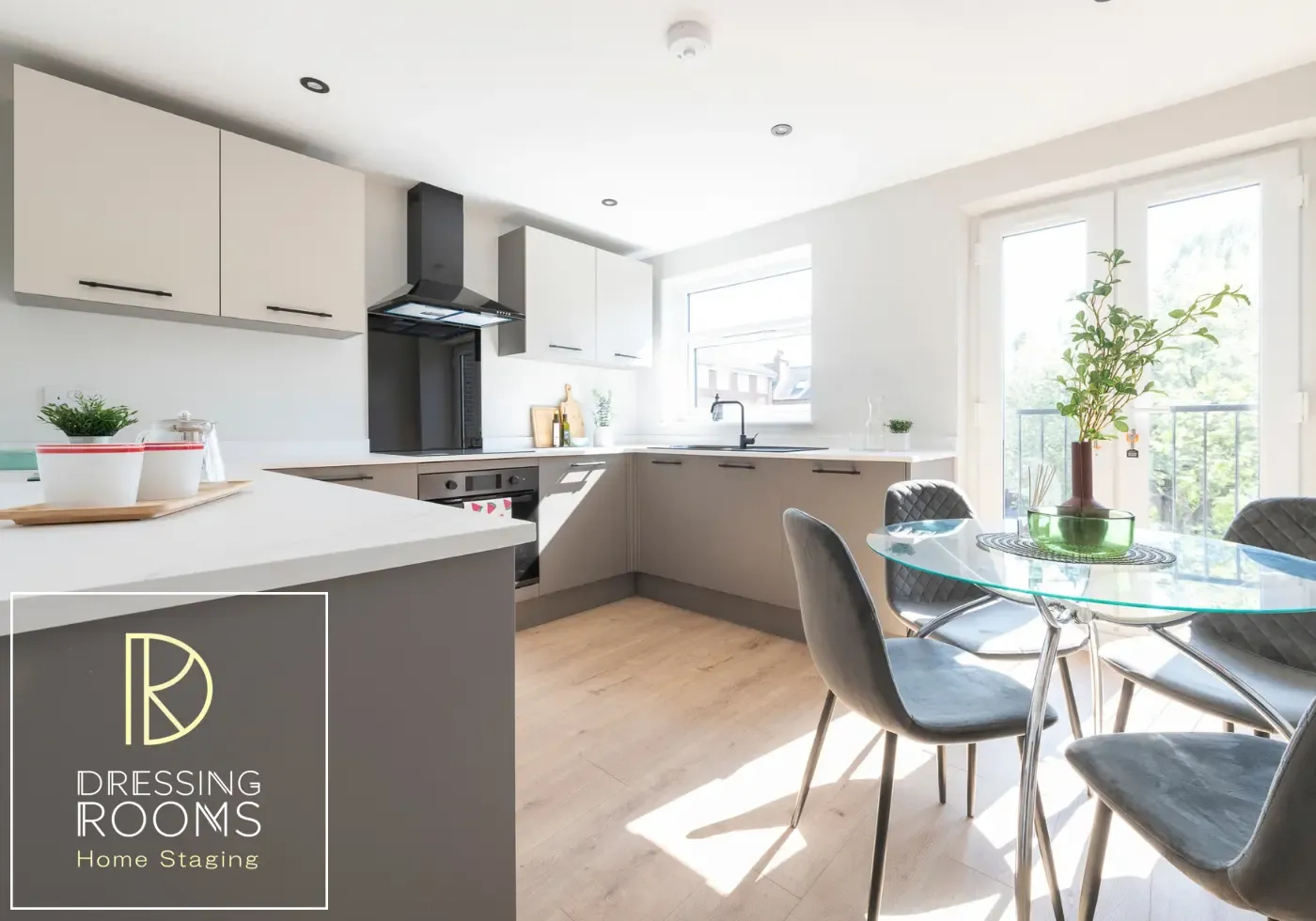 Open-plan kitchen and dining area staged for sale