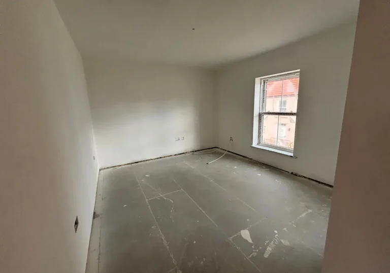 Before home staged bedroom large apcious with window