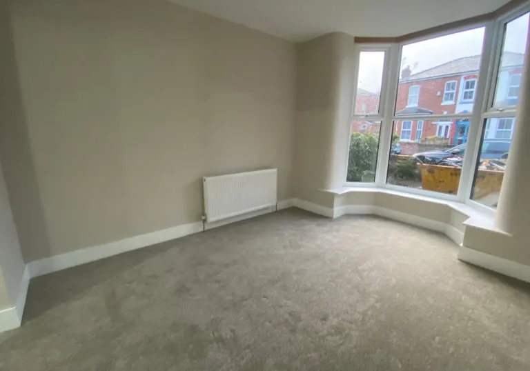Before professional home staging lounge with large window